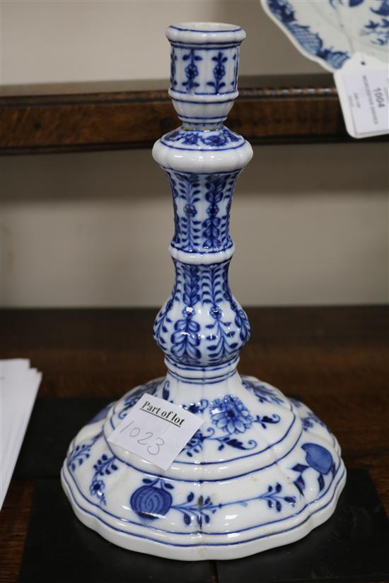 A pair of Meissen onion pattern blue and white candlesticks